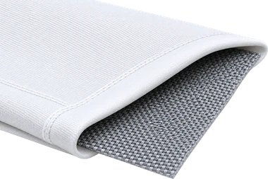 Filter press cloth folded back to show the grey backer cloth beneath it